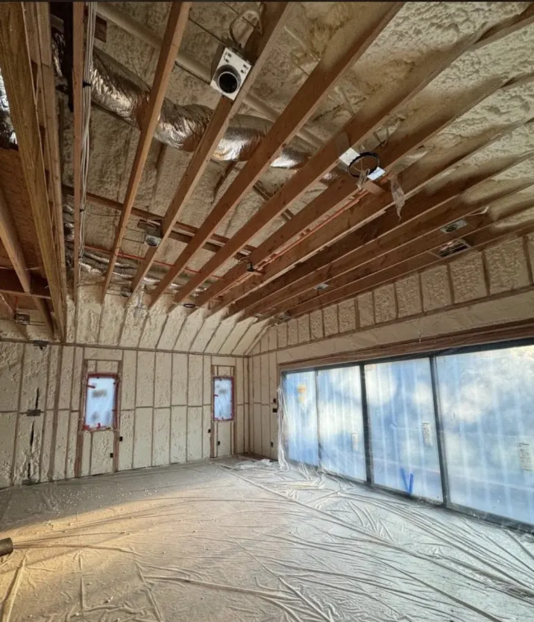Interior walls and ceiling insulated with spray foam during new construction in Temple
